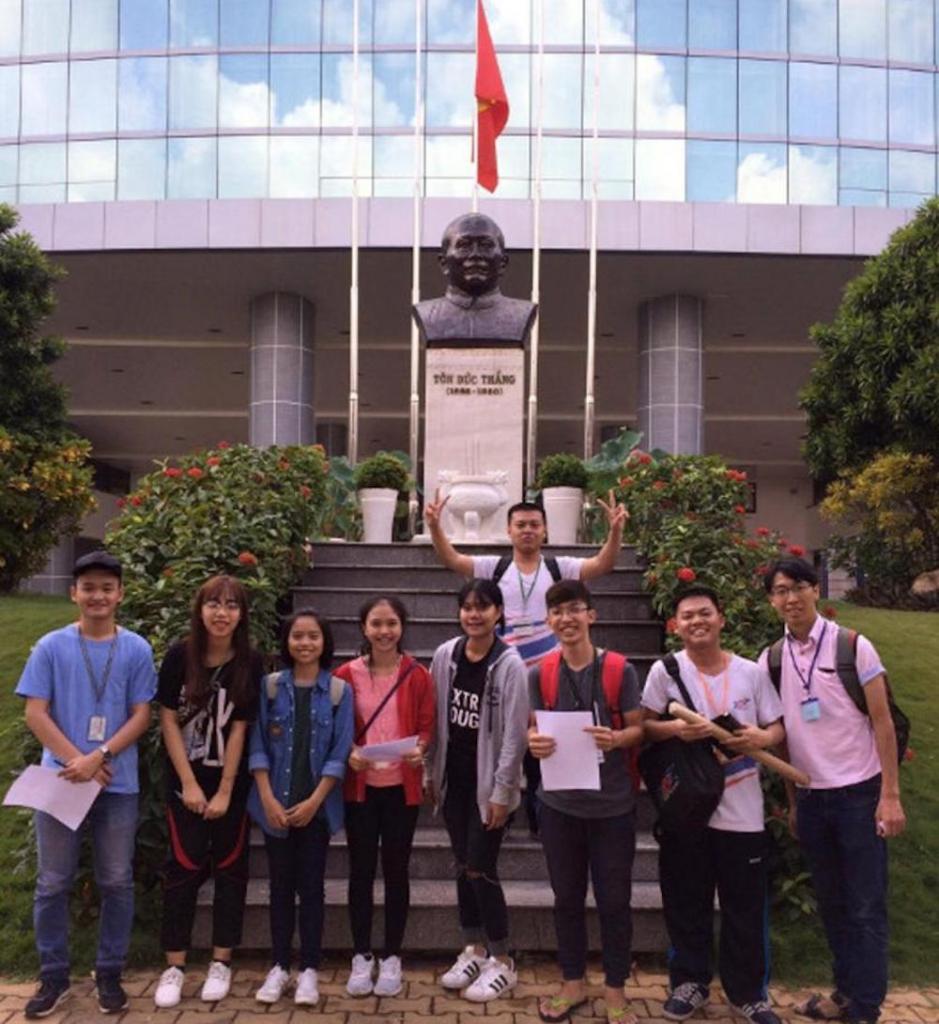 Your task: "In front of the bronze statue of Ton Duc Thang, have students take pictures for you!